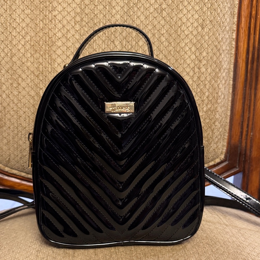 Harrods Elegant Black Quilted Backpack. Condition: Like new.